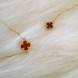 18k gold red clover necklace and bracelet bundle